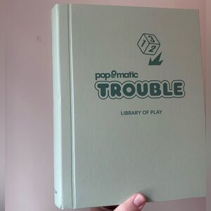 Library of Play - Pop-O-Matic Trouble Board Game Book - NEW